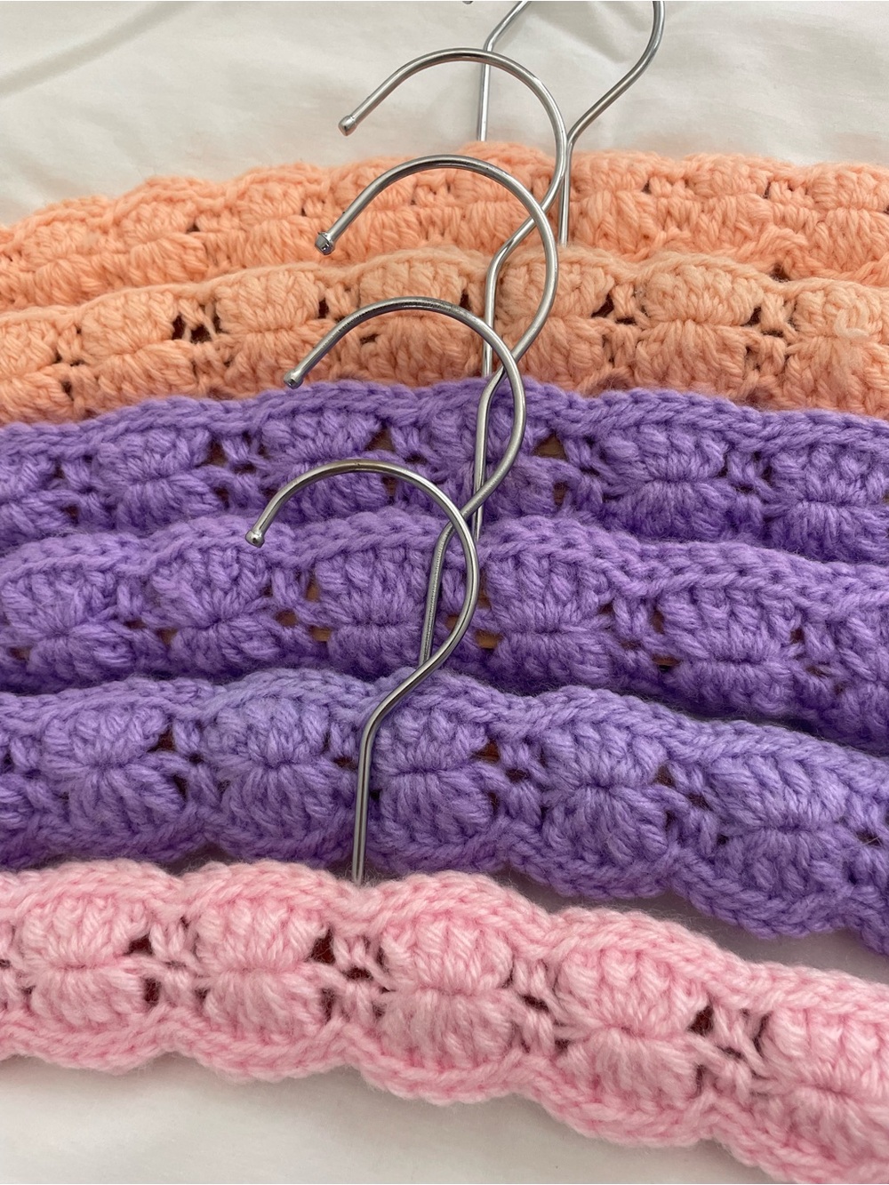 Six Crocheted Padded Wood Hangers in Pink, Lavender, and Peach